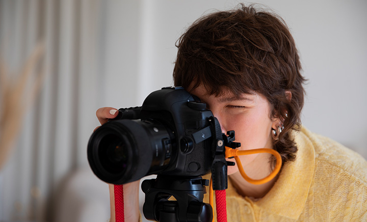 Young person using a camera